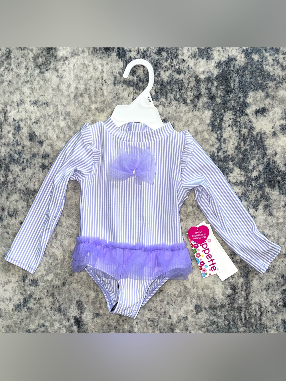 Wippette long sleeve swimsuit size 6-9 months